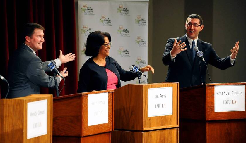 L.A. mayoral candidates from left, Kevin James, Jan Perry and Emanuel Pleitez react to a question during a debate at Loyola Marymount University Tuesday night.
