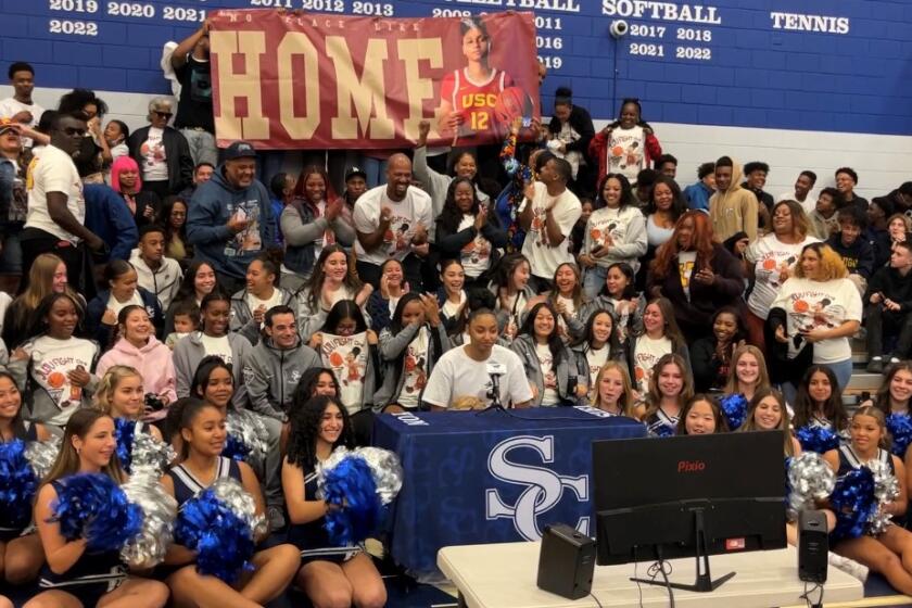 Sierra Canyon High star Juju Watkins announces she'll attend USC during a news conference Tuesday.