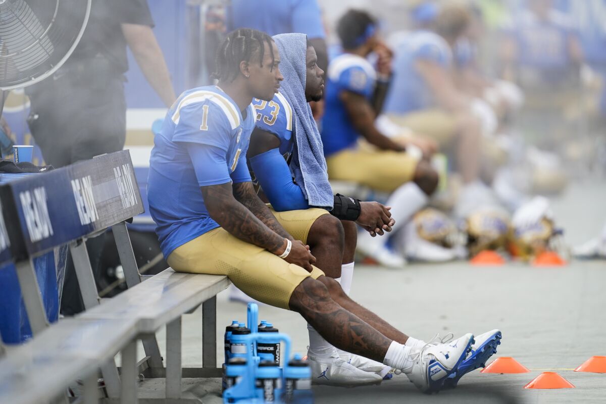 UCLA quarterback Dorian Thompson-Robinson (1) sits on the bench during the second half Sept. 10, 2022.