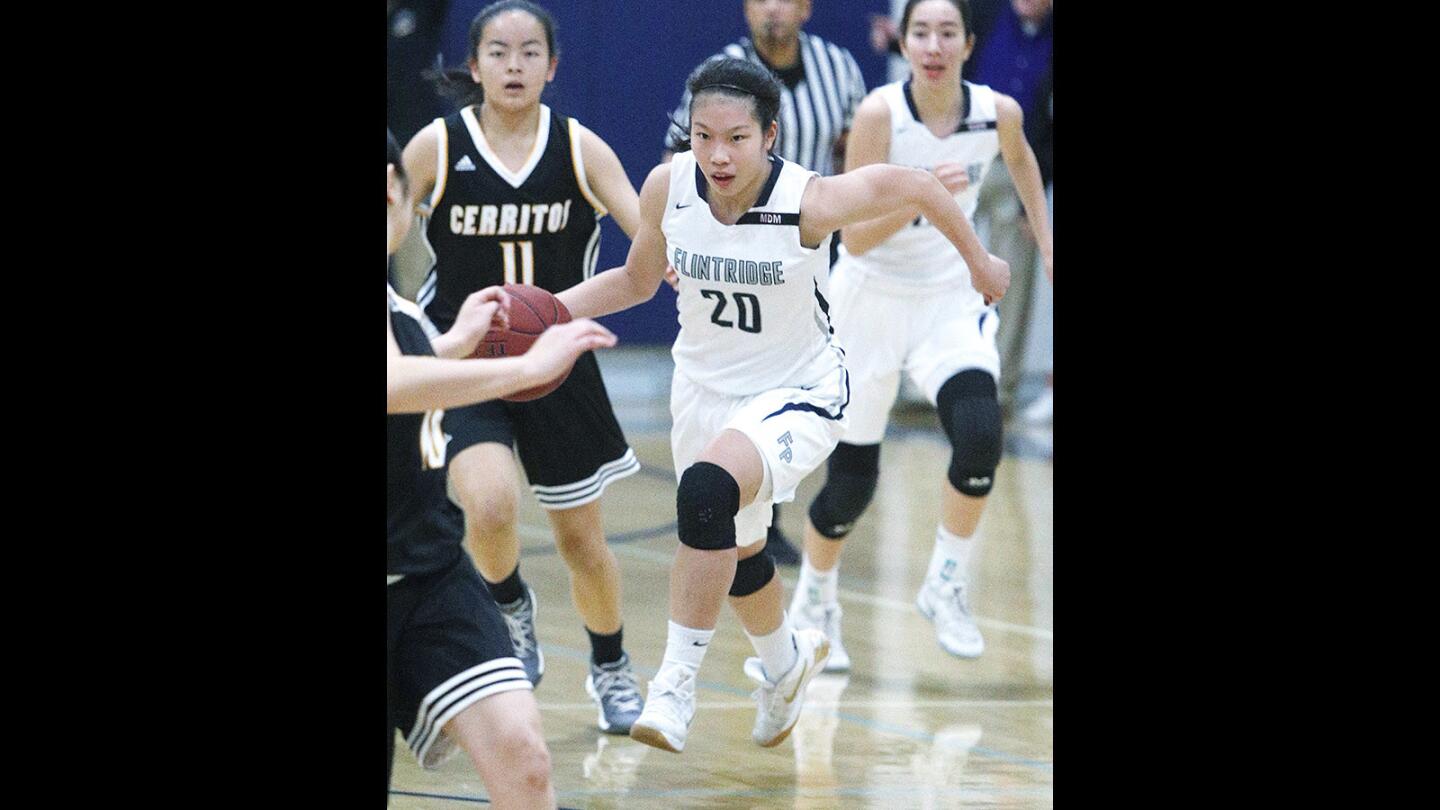 Flintridge Prep's Kaitlyn Chen takes the ball on a fast break against Cerritos in a CIF Southern Section Division III-A quarterfinal girls' basketball game at Flintridge Preparatory School on Wednesday, February 21, 2018.