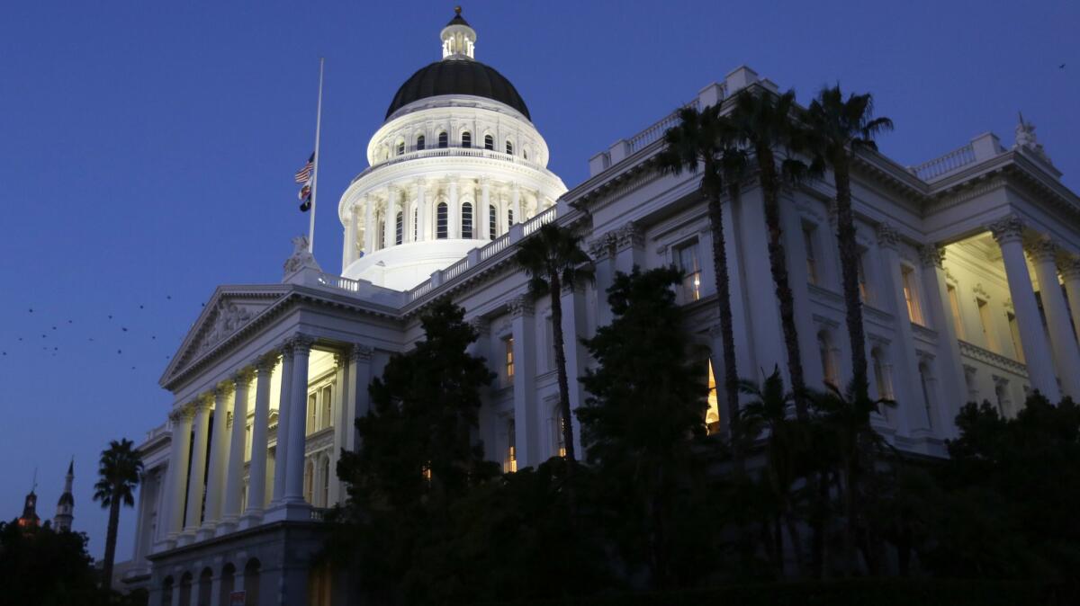 The lights of the Capitol dome shine in Sacramento, Calif. on Aug. 31.