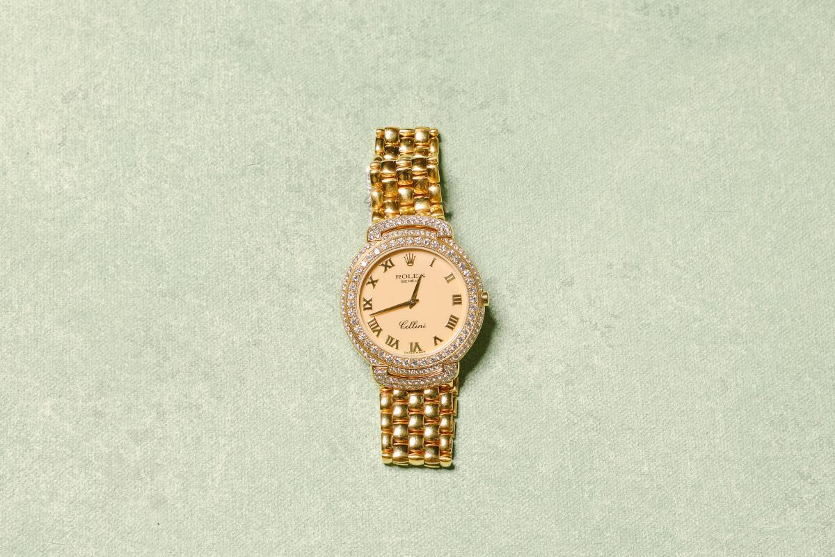 A gold Rolex adorned with diamonds at the office of Forty-Seventh & Fifth.