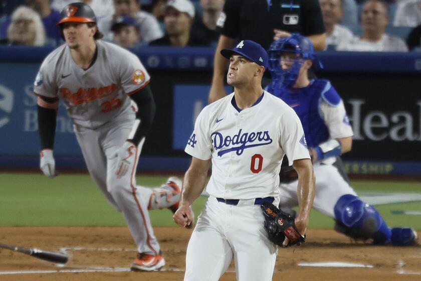 Los Angeles, CA - August 27: Dodgers starting pitcher Jack Flaherty #0, watches Orioles catcher Adley Rutschman's ball fly out at Dodger Stadium in Los Angeles Tuesday, Aug. 27, 2024. (Allen J. Schaben / Los Angeles Times)