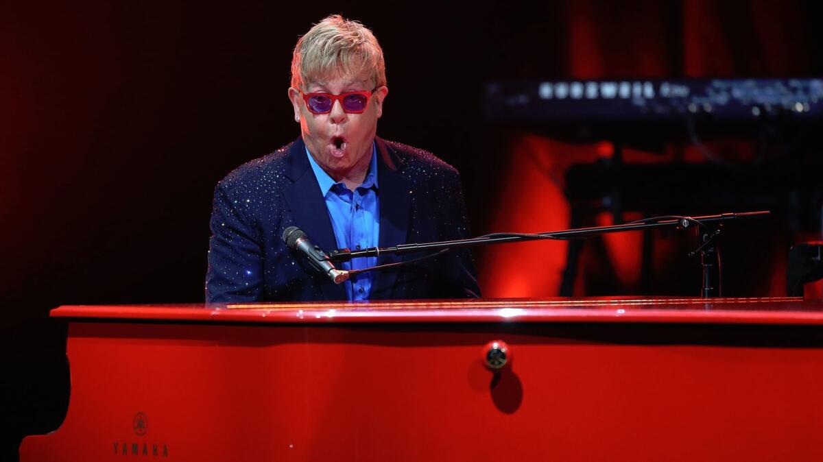 Elton John performs at the Wiltern Theater in 2016.