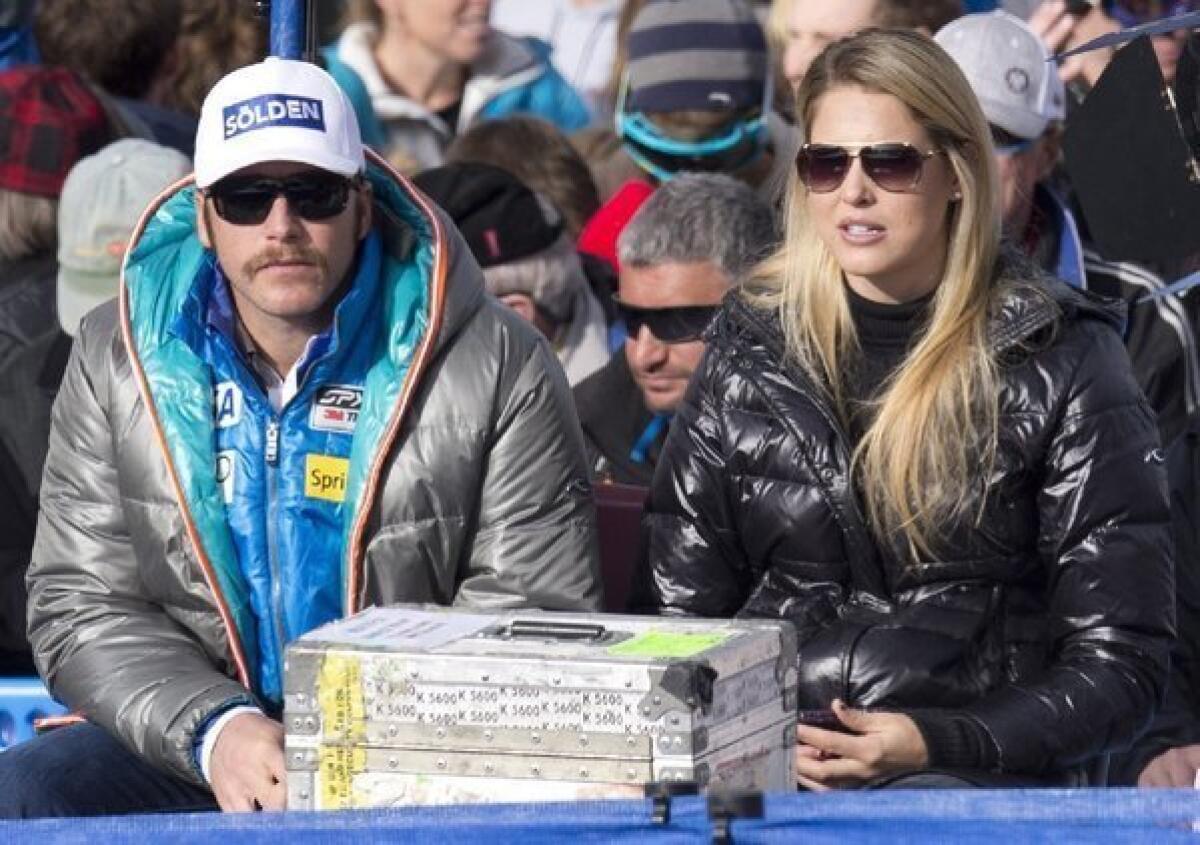 Bode Miller and his wife, Morgan, watch a skiing event on Nov. 30.