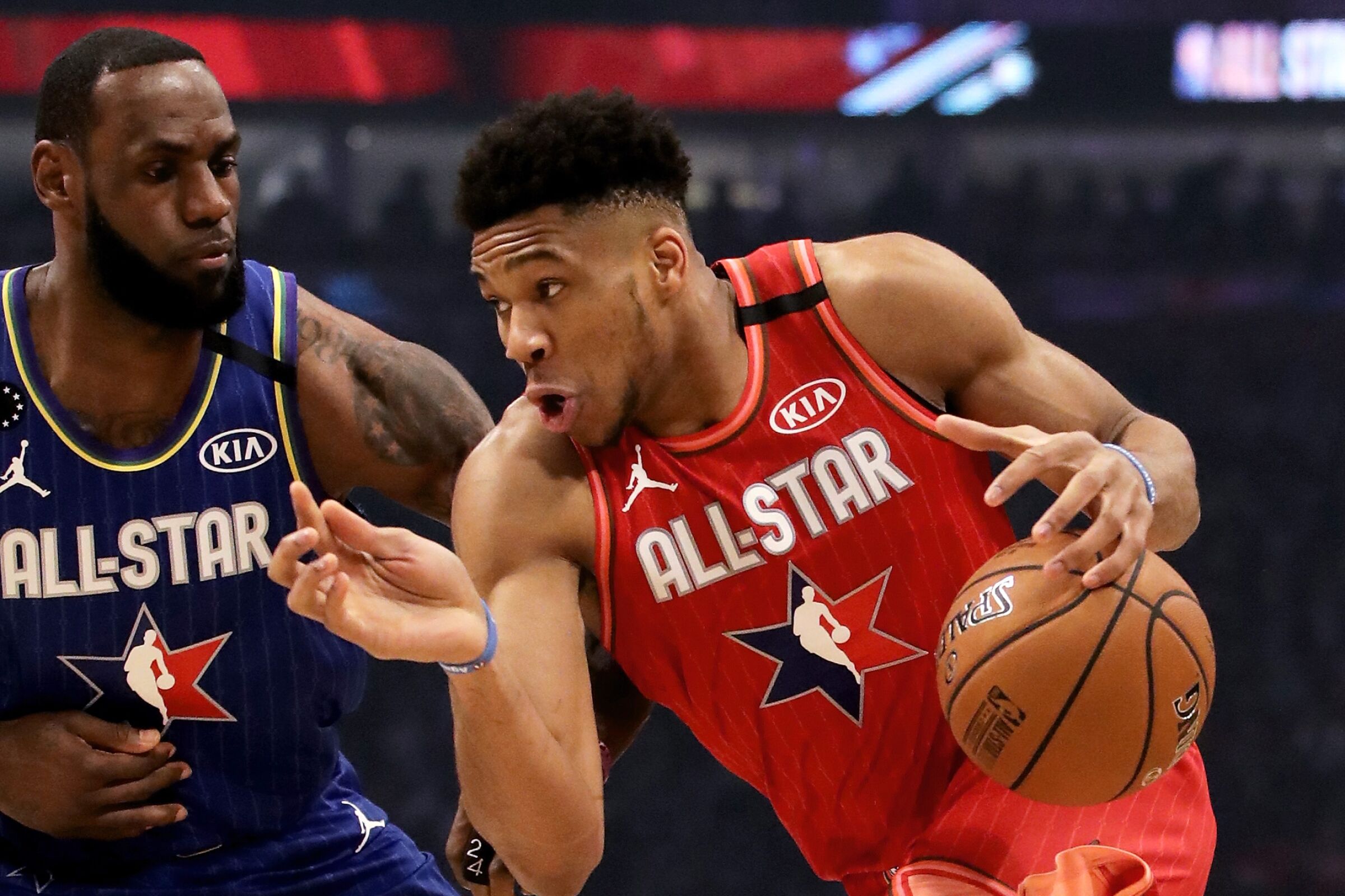 Giannis Antetokounmpo drives against LeBron James during the 2020 NBA All-Star Game in Chicago.