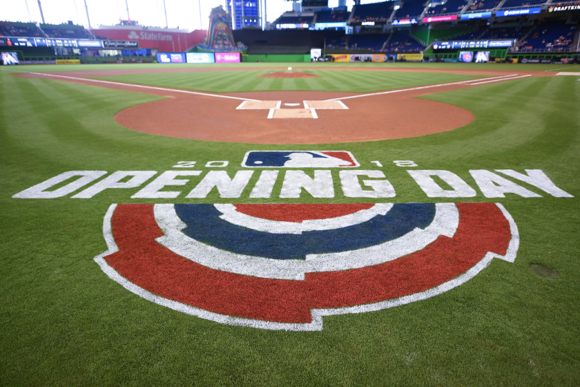 MLB opening day logo on field.