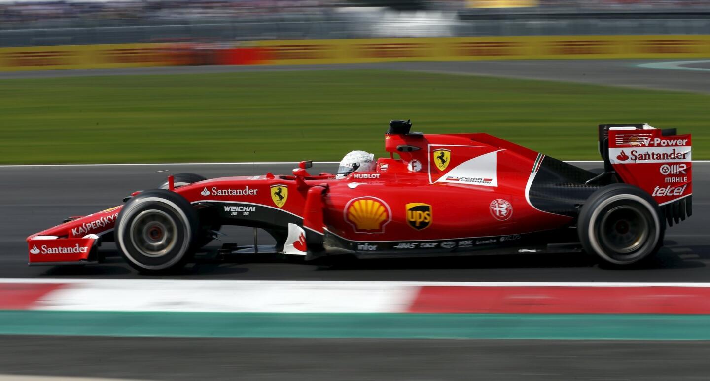 Ferrari's Formula One driver Sebastian Vettel of Germany drives during the Mexican F1 Grand Prix at Autodromo Hermanos Rodriguez in Mexico City