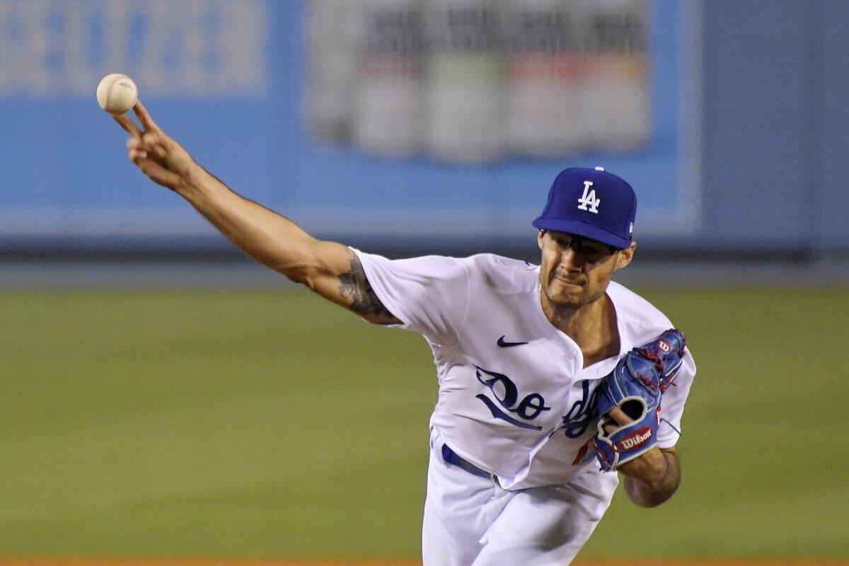 Los Angeles Dodgers relief pitcher Joe Kelly throws to the plate.