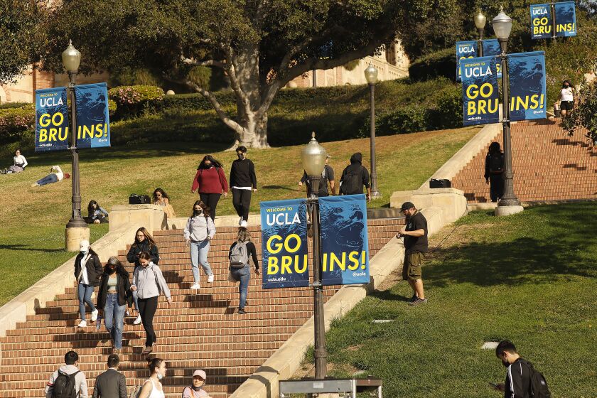 LOS ANGELES, CA - NOVEMBER 17: Photos of students on the UCLA campus as UCLA lecturers and students celebrate after a strike was averted Wednesday morning. Lecturers across the UC system were planning to strike Wednesday and Thursday over unfair labor practices. UCLA on Wednesday, Nov. 17, 2021 in Los Angeles, CA. (Al Seib / Los Angeles Times).