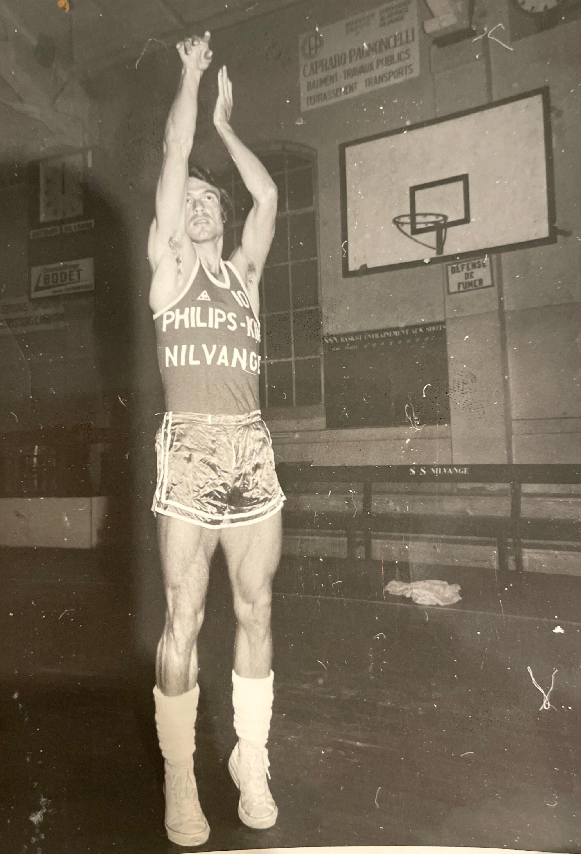 Bob Thate practices his shot while playing professional basketball in France.