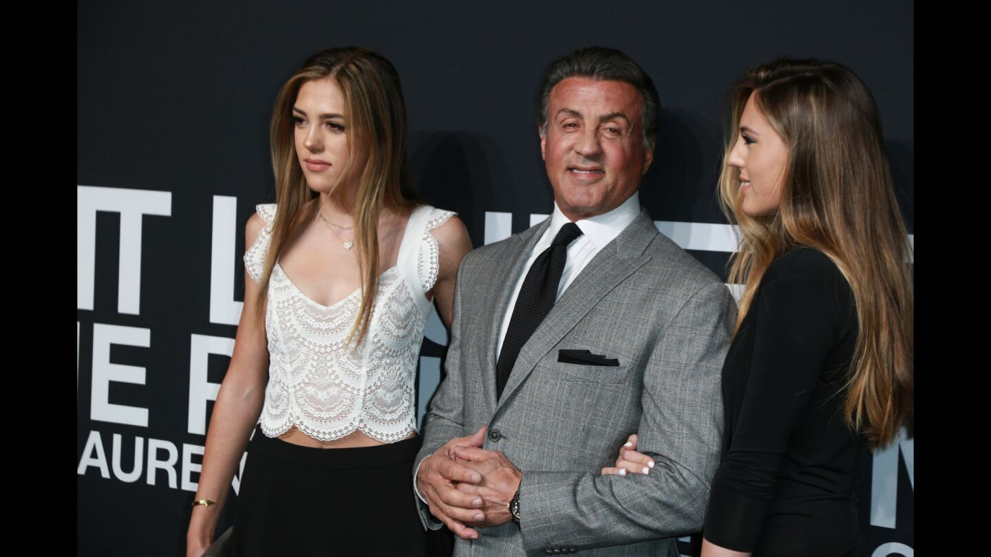 Sylvester Stallone at the Yves Saint Laurent fashion show.