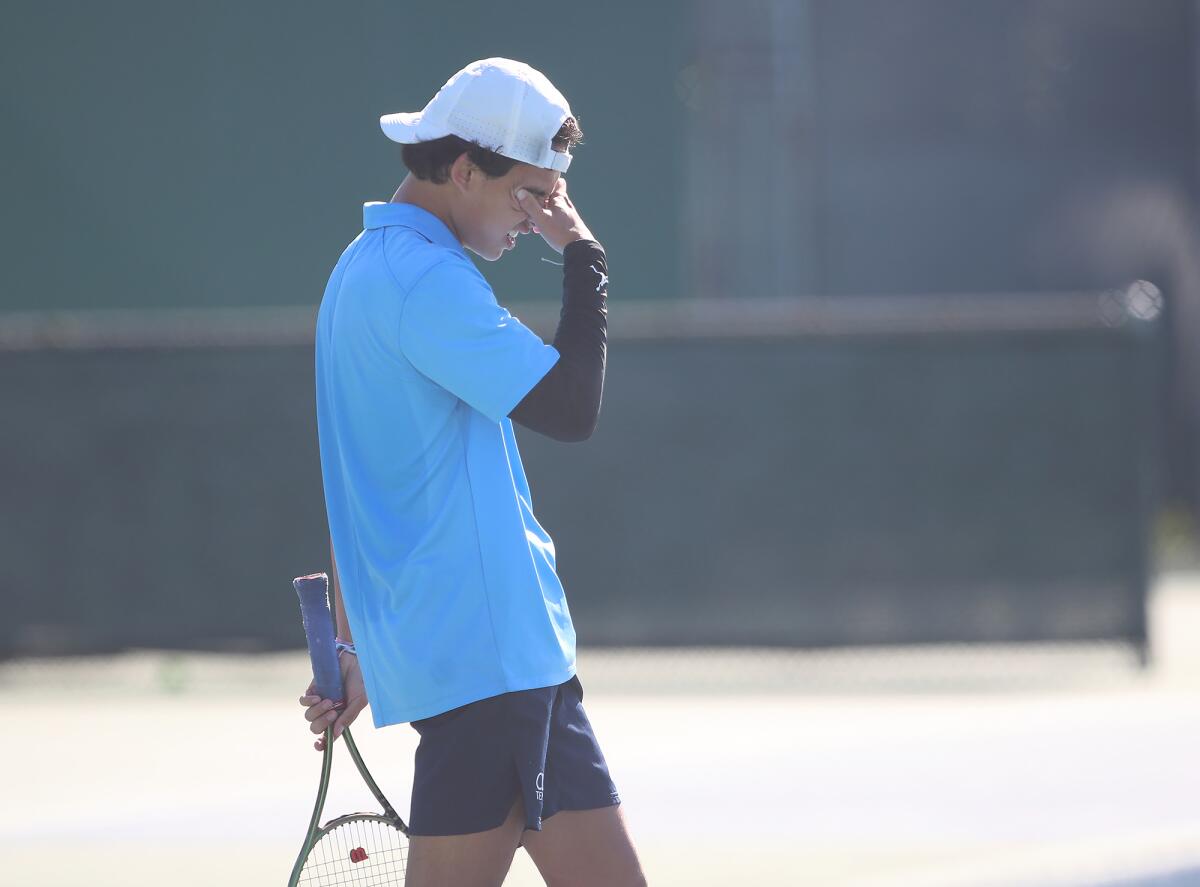 Corona del Mar's Brody Jao reacts to dropping a set against University on Wednesday at University High in Irvine.