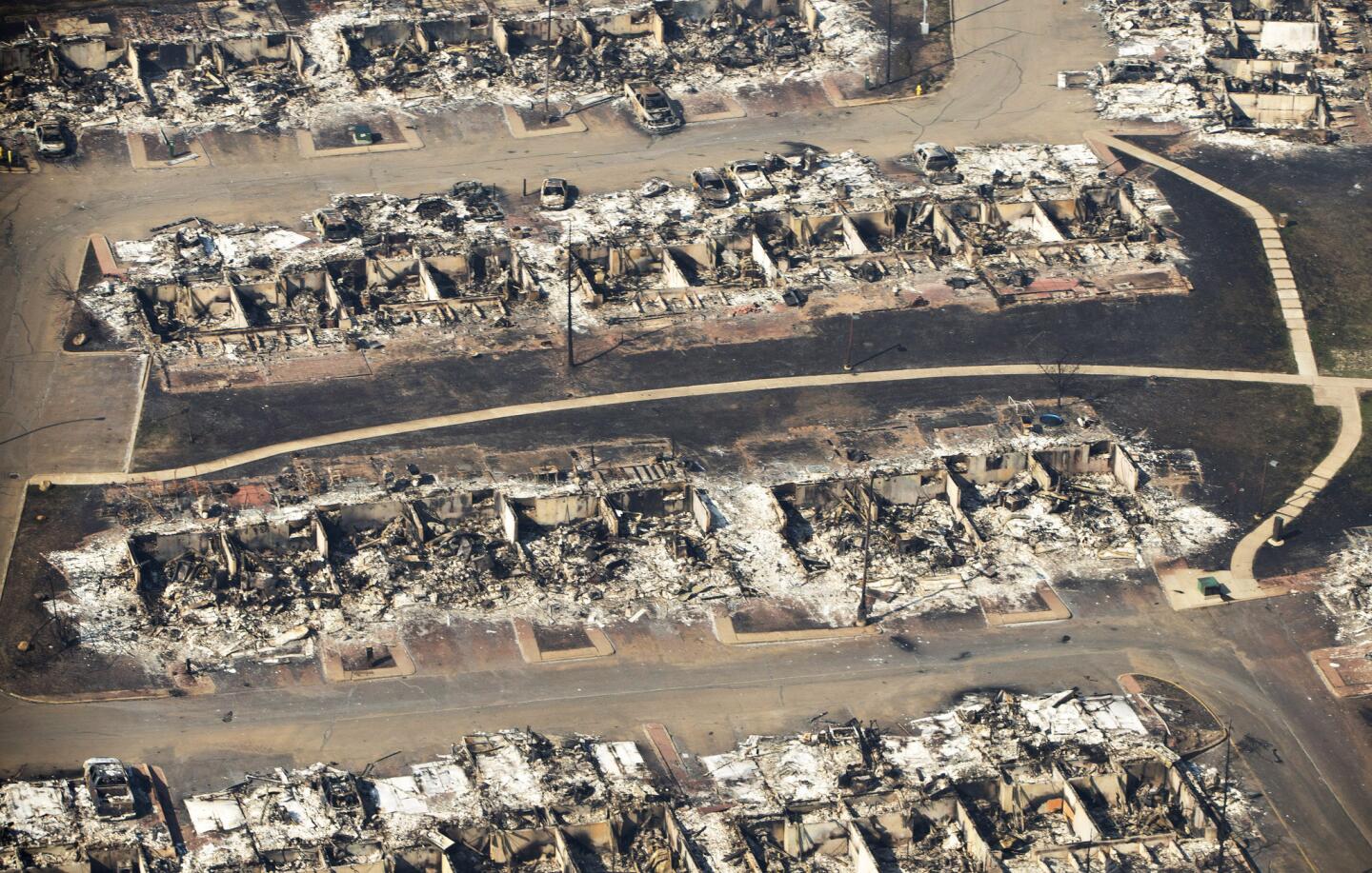 This aerial photo shows a devastated neighborhood in Fort McMurray, Alberta, Canada, on May 13, 2016.