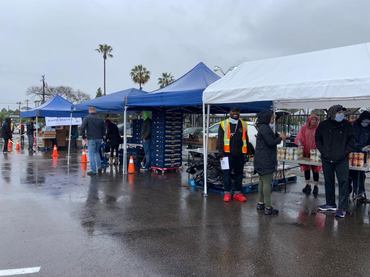 Volunteers from the Veterans Association of North County and American Legion Post 760 in Oceanside distributed food, in a drive-thru, to active duty military and veterans during the coronavirus pandemic.