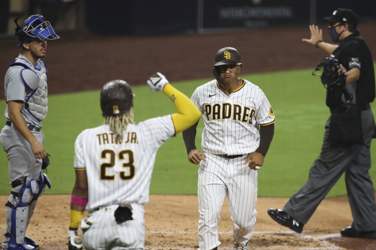 San Diego Padres' Trent Grisham reacts after hitting a solo home run.
