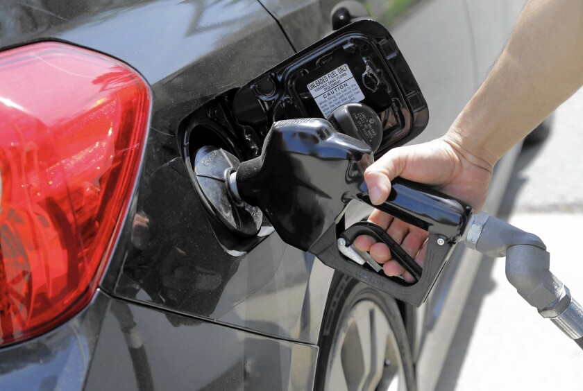 The drop in oil prices has lowered prices at the pump, but consumers aren't spending more.