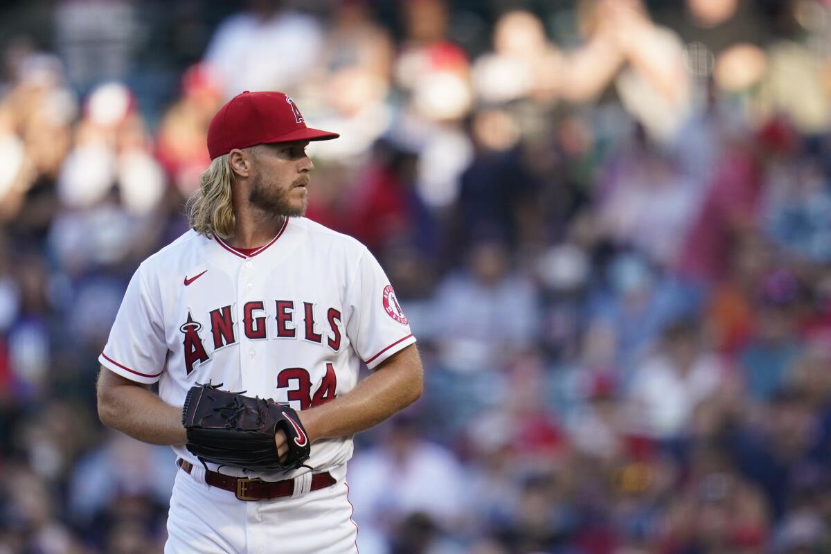 Angels pitcher Noah Syndergaard stands on the mound during the first inning against the Boston Red Sox.