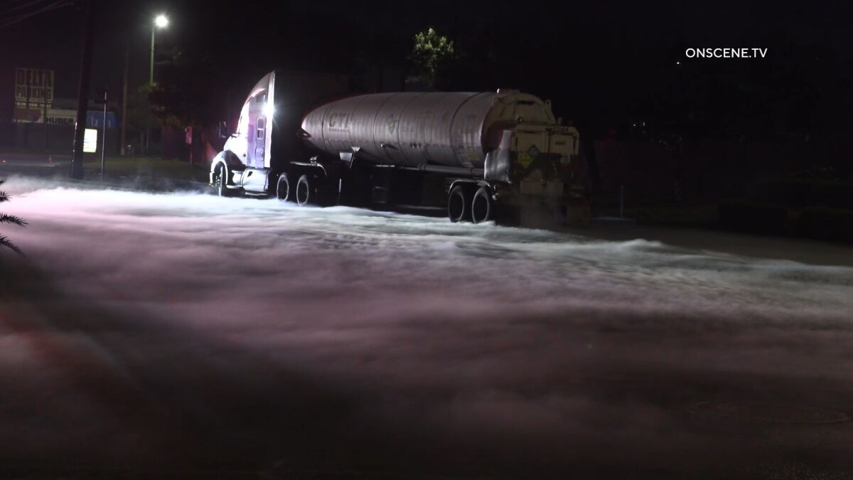 A tanker leaking liquid oxygen left a blanket of white on a street near Otay Mesa early Thursday