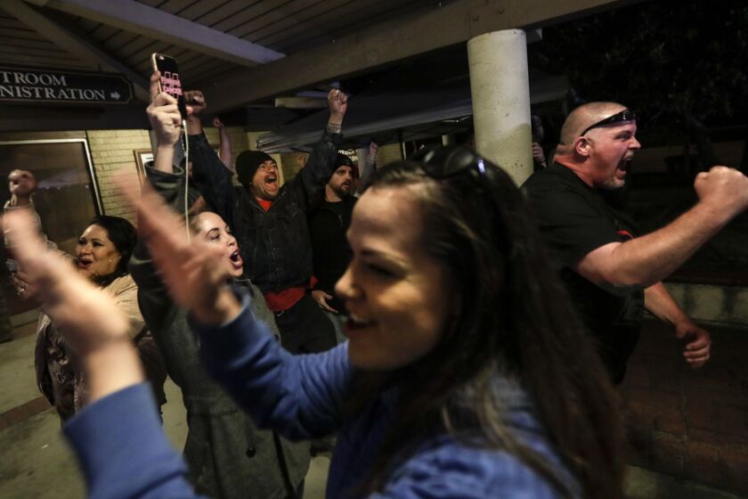 LOS ALAMITOS, CA, MONDAY, MARCH 19, 2018 - Spectators cheer as the Los Alamitos City Council votes to oppose California's sanctuary state law. (Robert Gauthier/Los Angeles Times)