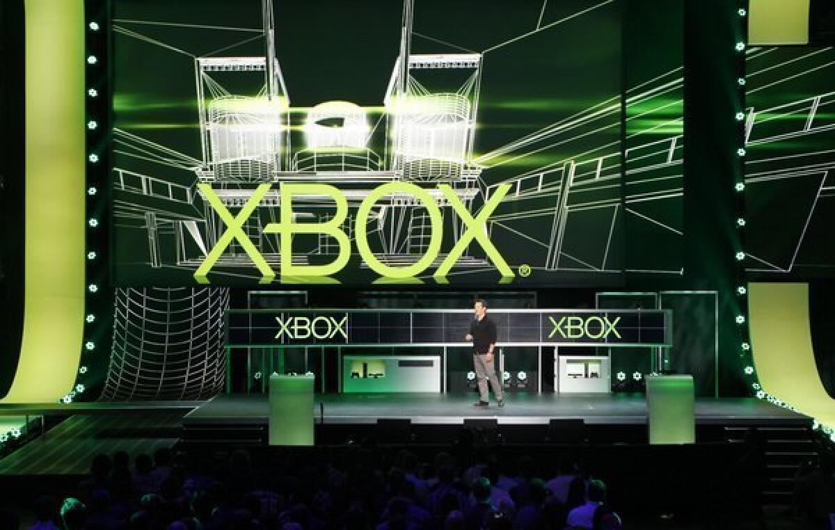 Microsoft's Xbox 360 console outsold Nintendo's Wii U and original Wii consoles combined during Thanksgiving week. Above, a Microsoft event at the E3 video game conference in June.