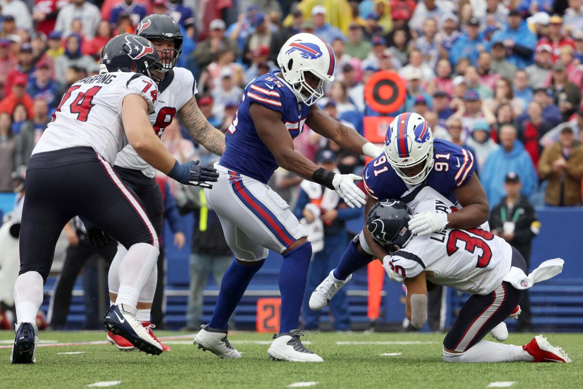 Ed Oliver (91), tackling Phillip Lindsay of the Houston Texans, helped the Buffalo Bills post their second shutout.