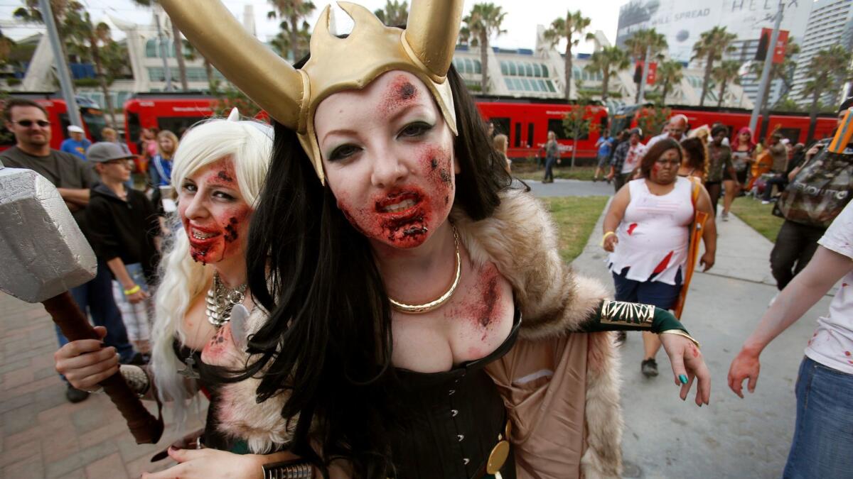 The now-defunct Zombie Walk, seen here in 2013, was an attraction fans without a convention badge enjoyed outside Comic-Con. This year, zombie-loving fans of late director George Romero will gather Saturday evening at San Diego's Children's Park for a horror cosplay meet up.
