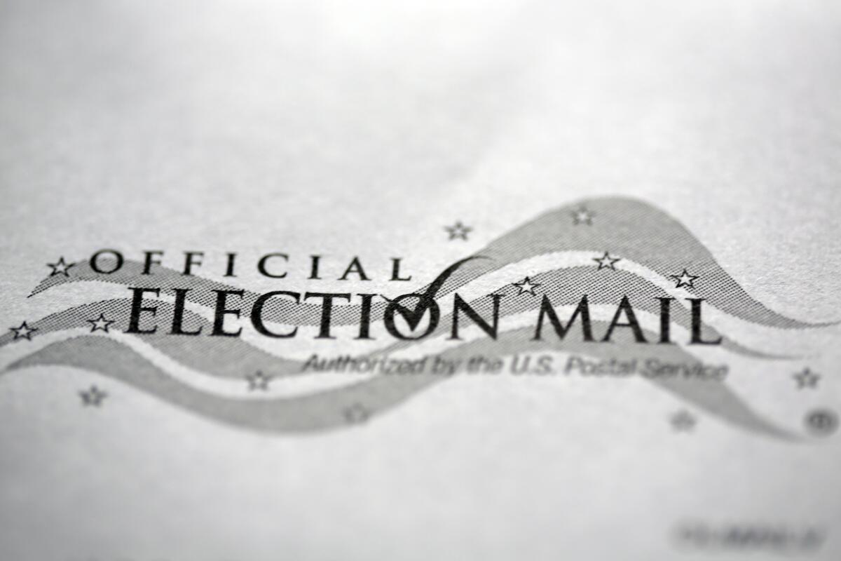 A mail-in official ballot return envelope for the 2020 general election is shown in Havertown, Pa., on Oct. 12.  