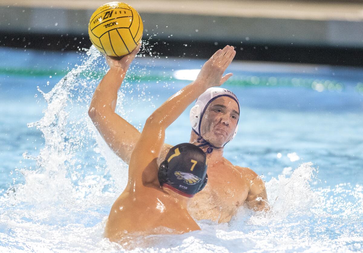 Marina's Sam Capifoni takes a shot against Estancia's Noah Will in the first round of the CIF Southern Section Division 5 playoffs at Costa Mesa High on Tuesday.