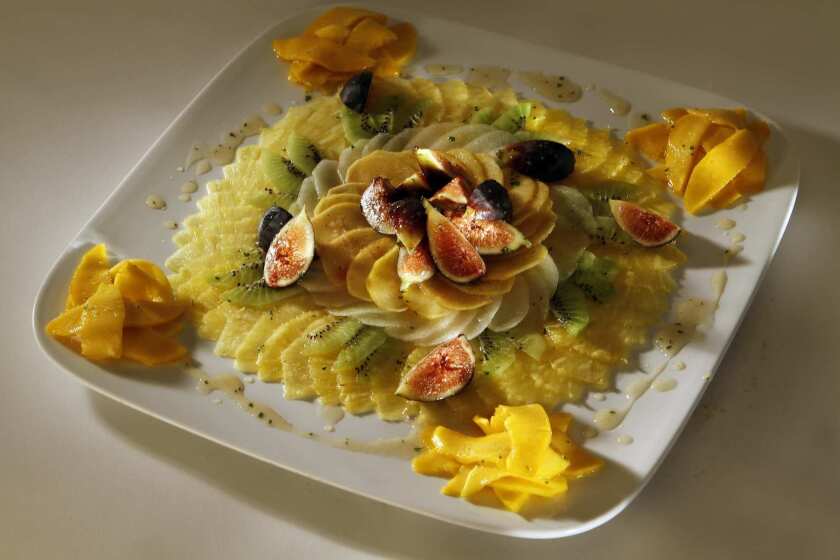 Fruit carpaccio with honey, lime and ginger dressing. Recipe
