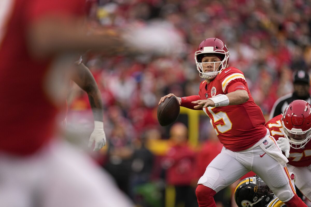 Kansas City Chiefs quarterback Patrick Mahomes looks to pass against the Pittsburgh Steelers.