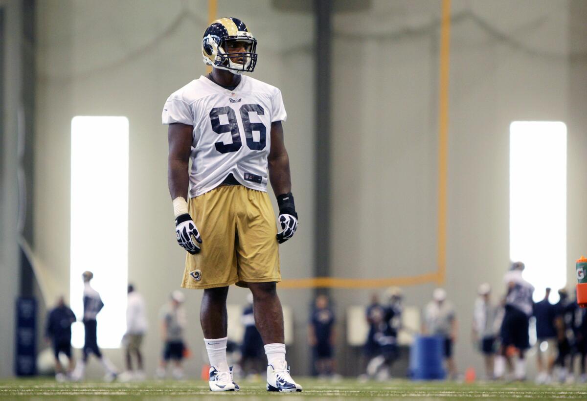 St. Louis defensive end Michael Sam practices during the first day of training camp for rookies in Earth City, Mo., on July 22.