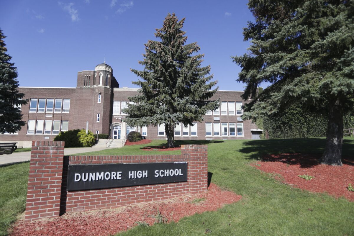 Dunmore High School sign in front of a building