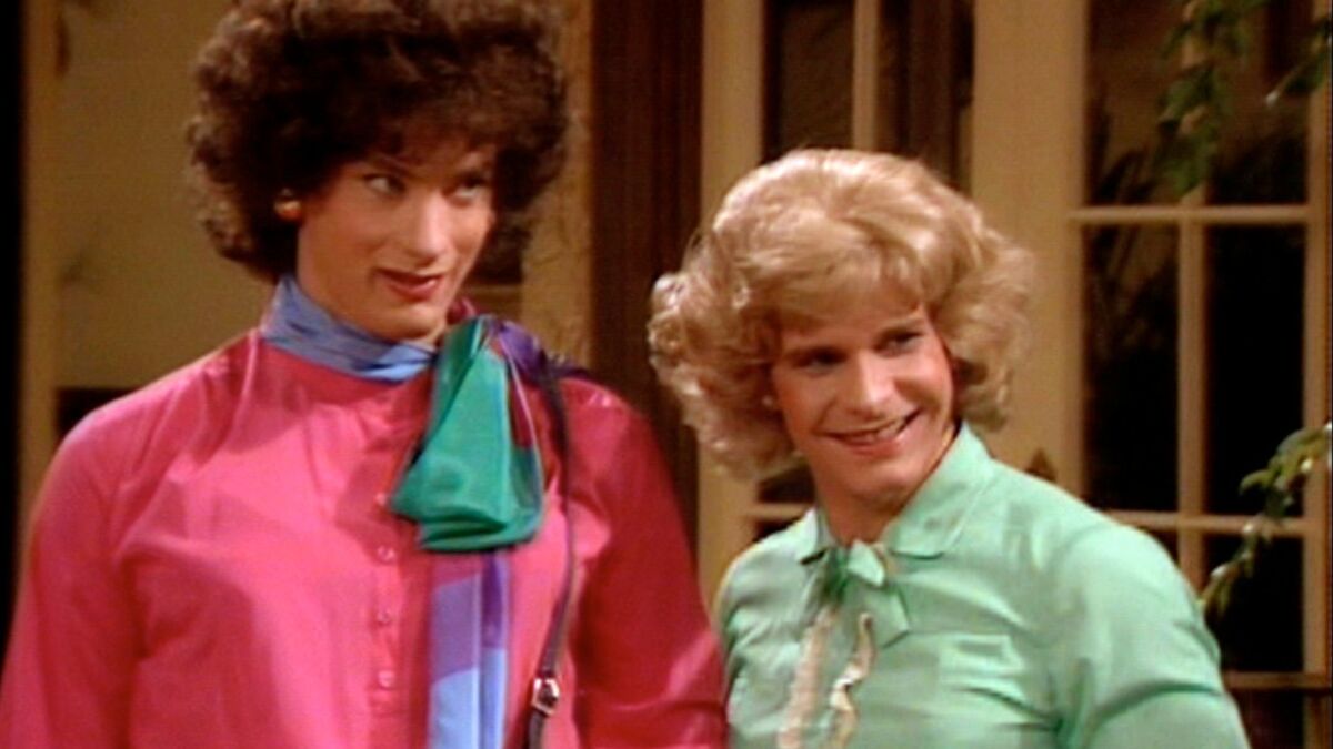 Tom Hanks (left, as Buffy Wilson) and Peter Scolari (as Hilde Desmond) in a scene from an episode of the television comedy series "Bosom Buddies."
