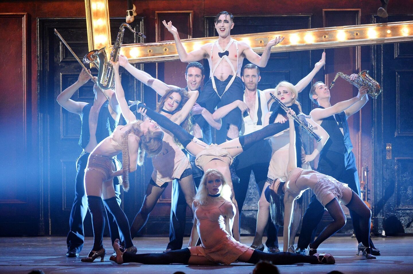 Alan Cumming and the cast of "Cabaret" perform onstage.