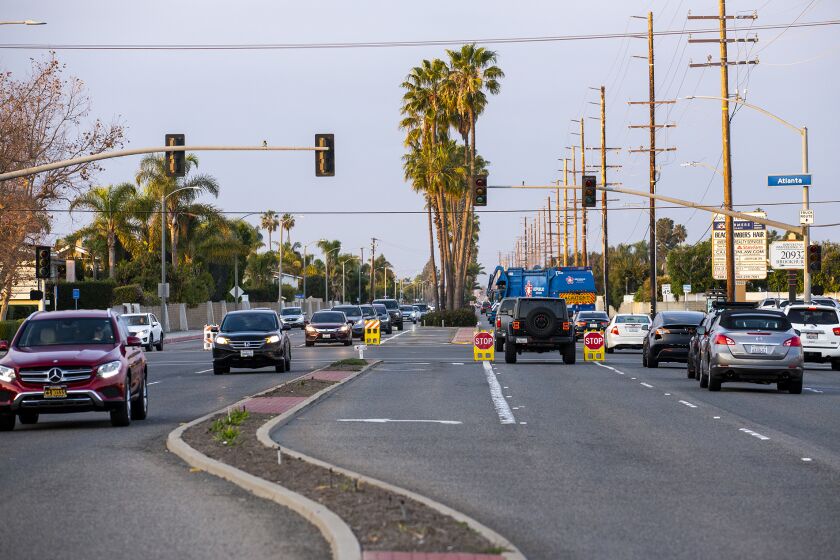 Huntington Beach, CA - November 28: cars take turns at the intersection of Atlanta Ave. and Brookhurst St. due to a power outage on Monday, Nov. 28, 2022 in Huntington Beach, CA. (Scott Smeltzer / Daily Pilot)