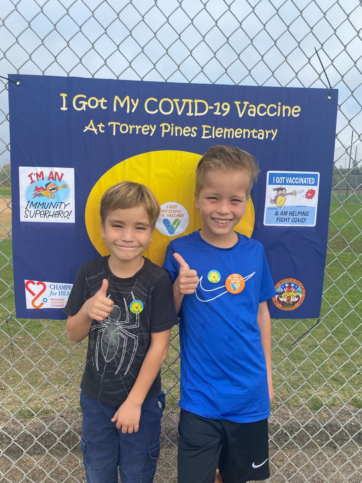 Ben and Eric Sorensen received COVID-19 vaccines at a La Jolla vaccination event organized by their mother, Dr. Tania Rivera,