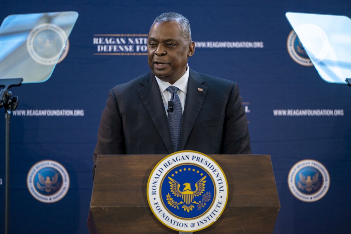 In this photo provided by the Office of the Secretary of Defense, U.S. Secretary of Defense Lloyd Austin delivers the keynote address at the Reagan National Defense Forum at the Ronald Reagan Presidential Library in Simi Valley, Calif., Saturday, Dec. 4, 2021. (Chad J. McNeeley/Office of the Secretary of Defense via AP)