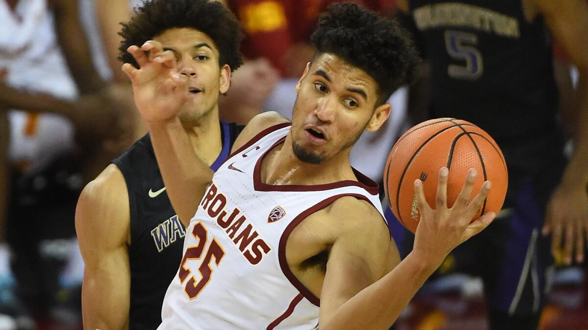 Bennie Boatwright, pulling down a rebound against Washington last season, returned to the USC lineup on Wednesday after missing nine months because of a knee injury.