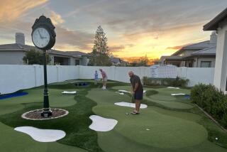 Andrew Augustyniak created a miniature version of Augusta National Golf Club in his backyard in Gilbert, Ariz.