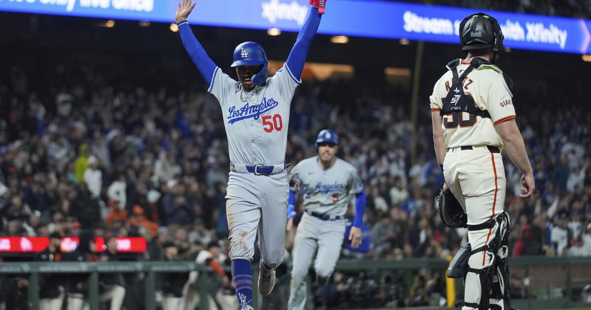 Topsy-turvy game ends with Dodgers beating Giants in extra innings