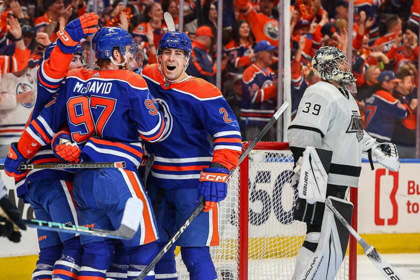 EDMONTON, AB - APRIL 22: Edmonton Oilers Defenceman Evan Bouchard (2) celebrates a goal.