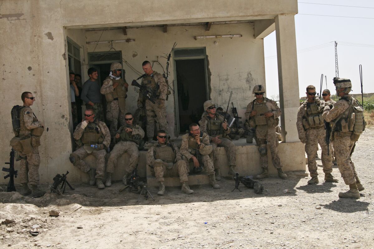 U.S. Marines from 1st Battalion, 5th Marines prepare for a patrol 