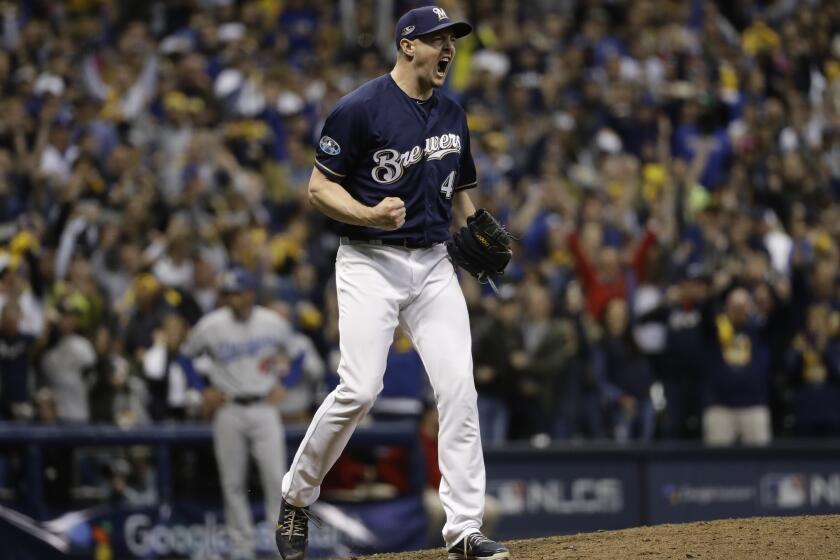 Milwaukee Brewers relief pitcher Corey Knebel reacts at the end of Game 1 of the 2018 National League Championship Series.