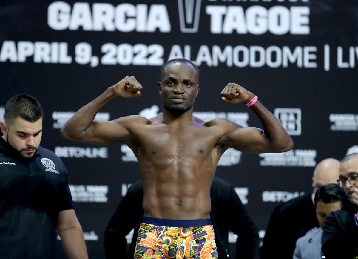 Emmanuel Tagoe poses for a crowd during his weigh in Friday in San Antonio, Texas.