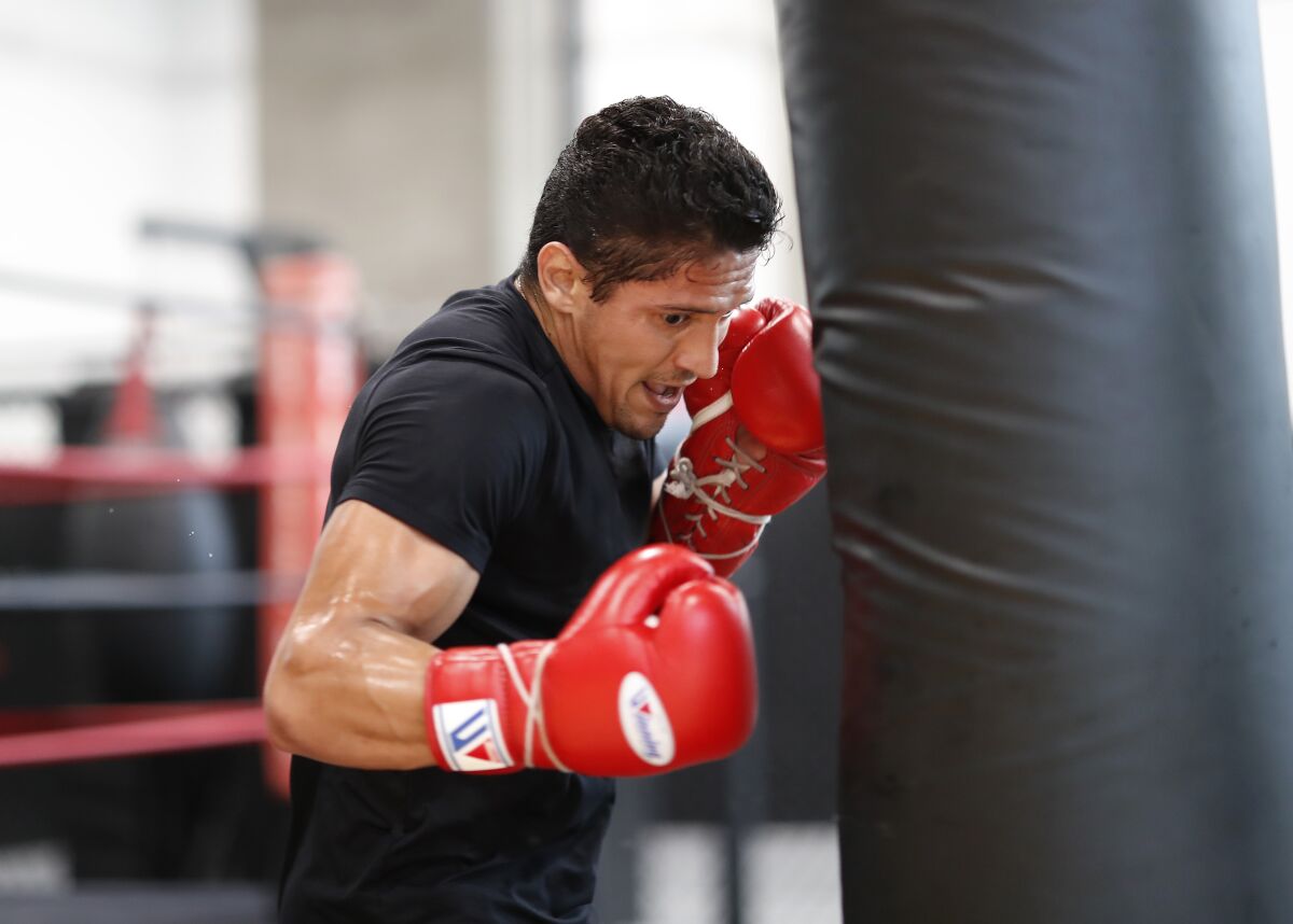 Giovani Santillan works out at The BXNG Club in downtown San Diego.