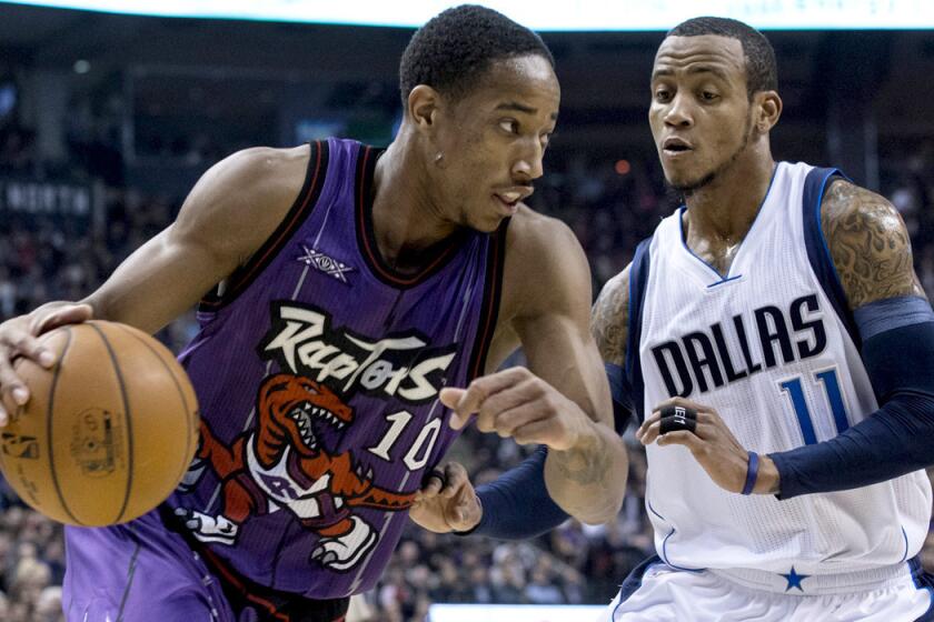 Raptors guard DeMar DeRozan (10) drives against Mavericks guard Monta Ellis during the first half of their game Friday in Toronto.