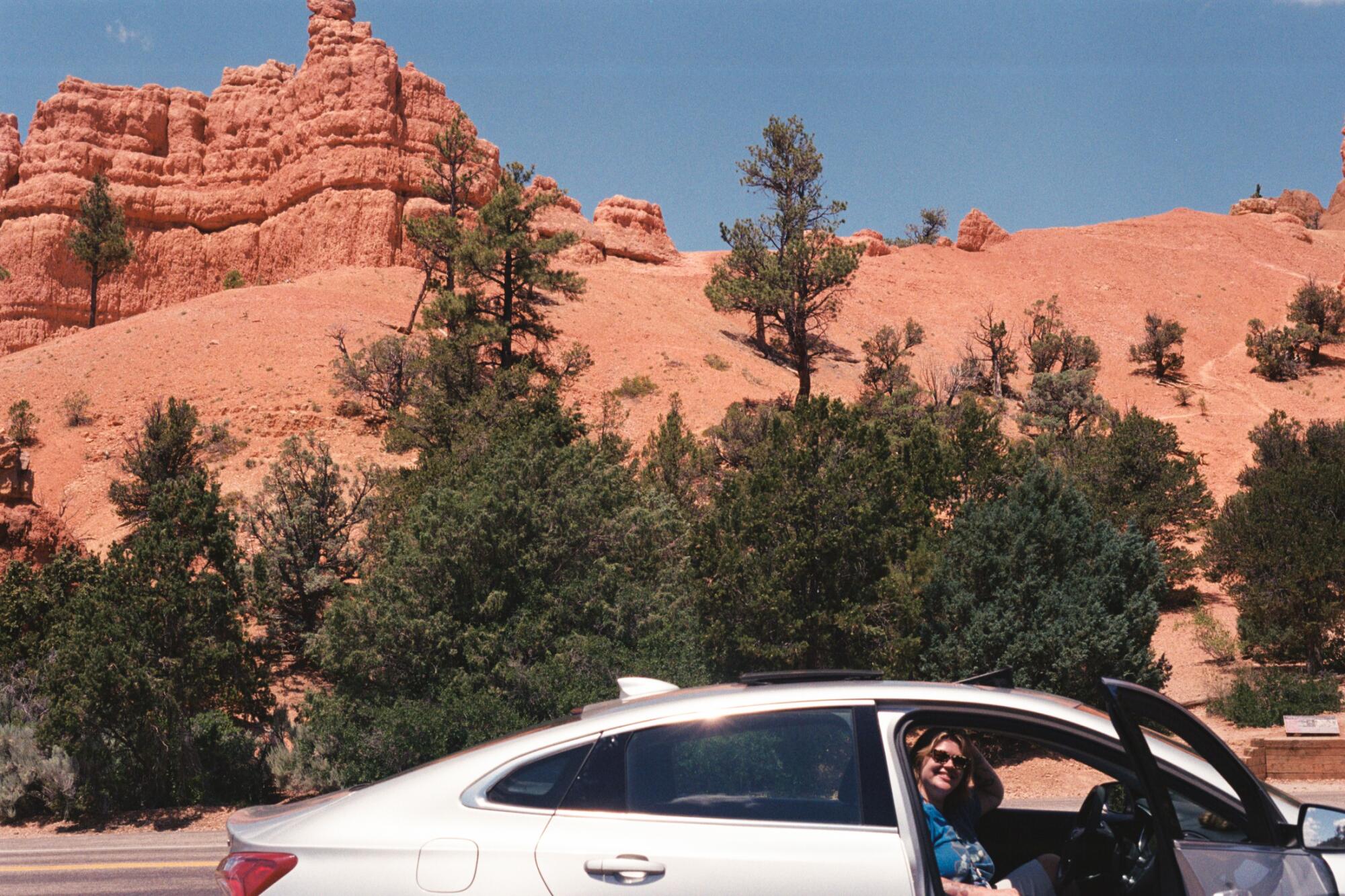 Julia driving through Bryce Canyon National Park on the Grand Circle road trip.