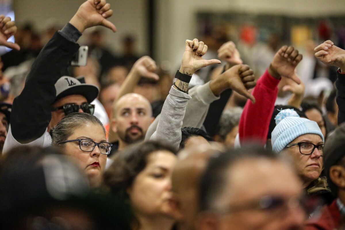 Hundreds of union members and community members from San Pedro and Wilmington show their opposition to automation during a Harbor Commission meeting.