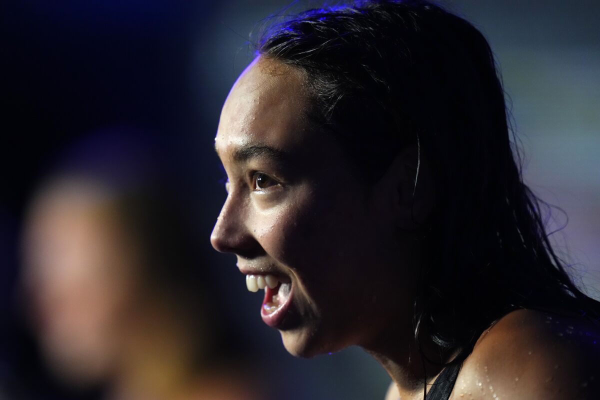 Torri Huske of the United States reacts after winning the Women 100m Butterfly final at the 19th FINA World Championships in Budapest, Hungary, Sunday, June 19, 2022. (AP Photo/Petr David Josek)
